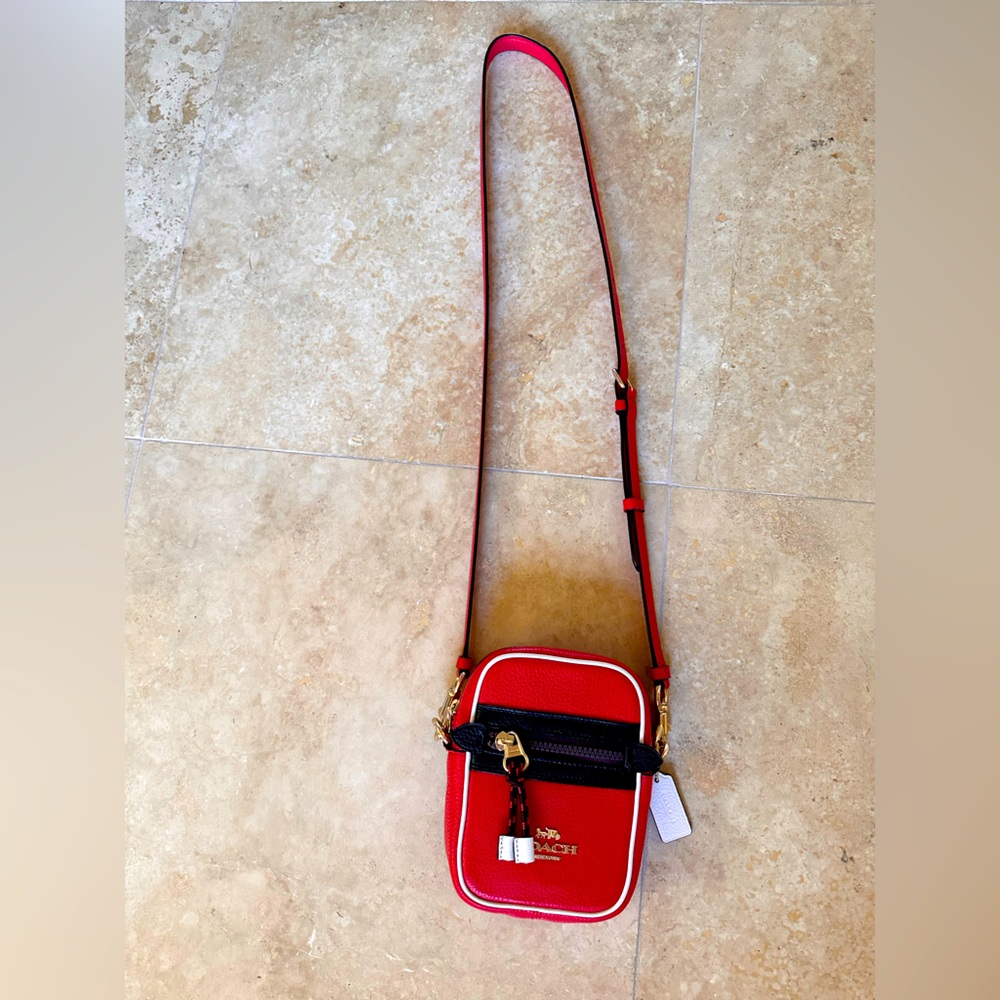 Coach crossbody purse.